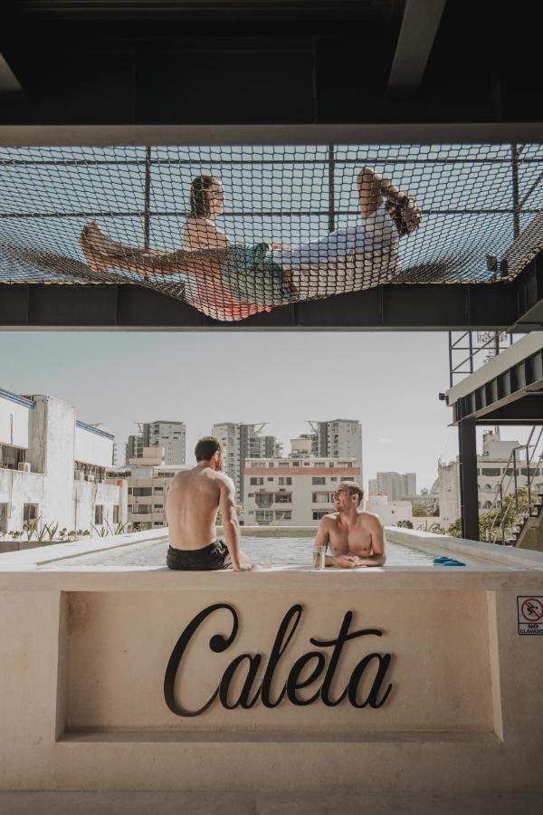 Caleta Hostel Rooftop & Pool 坎昆 外观 照片