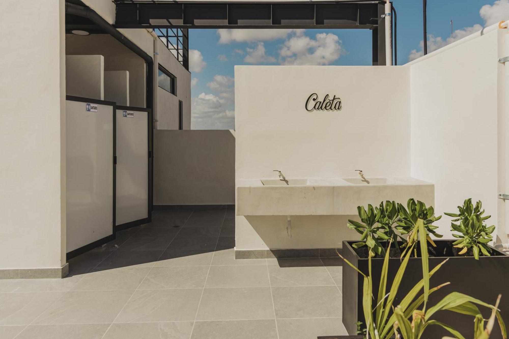 Caleta Hostel Rooftop & Pool 坎昆 外观 照片